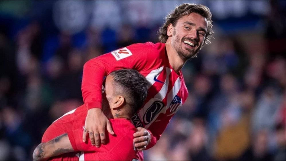 With a hat-trick, Antoine Griezmann propels Atletico Madrid into the Champions League.